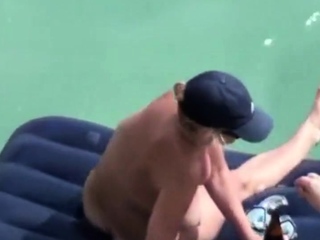 my mom floats on a mattress with dangling tits